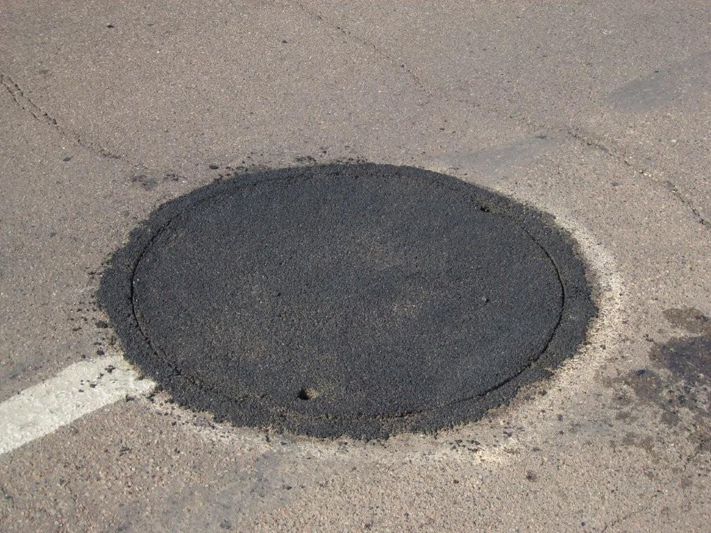 Manhole Lid Leveling